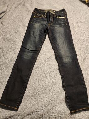American Eagle Outfitters Dark Wash Skinny Jeans with Gold Accents